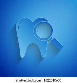 Paper cut Dental search icon isolated on blue background. Tooth symbol for dentistry clinic or dentist medical center. Paper art style. Vector Illustration