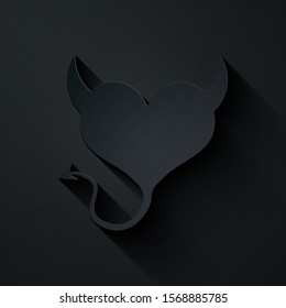 Paper cut Devil heart with horns and a tail icon isolated on black background. Valentines Day symbol. Paper art style. Vector Illustration