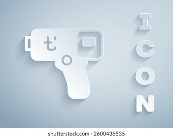Paper cut Digital contactless thermometer with infrared light icon isolated on grey background. Paper art style. Vector