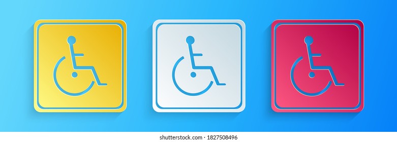 Paper cut Disabled handicap icon isolated on blue background. Wheelchair handicap sign. Paper art style. Vector.