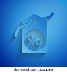 Paper cut Discount percent tag icon isolated on blue background. Shopping tag sign. Special offer sign. Discount coupons symbol. Paper art style. Vector Illustration