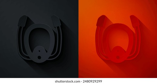 Máscara de buceo con icono de snorkel aislado sobre fondo negro y rojo. Deporte extremo. Equipo de buceo submarino. Estilo de arte de papel. Vector