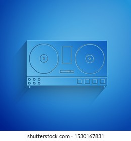 Paper cut DJ remote for playing and mixing music icon isolated on blue background. DJ mixer complete with vinyl player and remote control. Paper art style. Vector Illustration