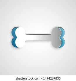Paper cut Dog bone icon isolated on grey background. Pets food symbol. Paper art style. Vector Illustration