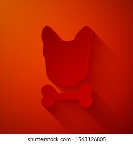 Paper cut Dog and bone icon isolated on red background. Pets food symbol. Paper art style. Vector Illustration