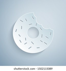 Paper cut Donut with sweet glaze icon isolated on grey background. Paper art style. Vector Illustration