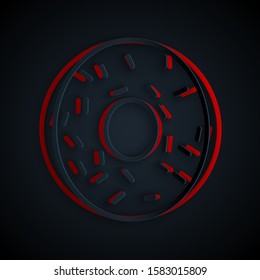 Paper cut Donut with sweet glaze icon isolated on black background. Paper art style. Vector Illustration
