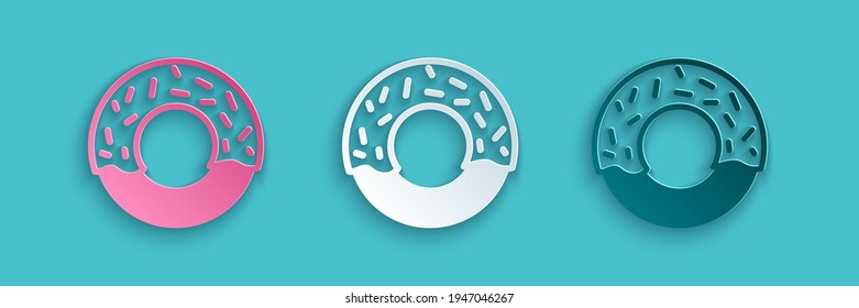 Paper cut Donut with sweet glaze icon isolated on blue background. Paper art style. Vector