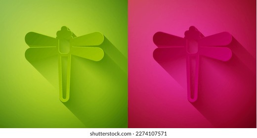 Paper cut Dragonfly icon isolated on green and pink background. Paper art style. Vector