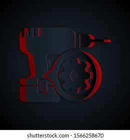 Paper cut Drill machine and gear icon isolated on black background. Adjusting app, service concept, setting options, maintenance, repair, fixing. Paper art style. Vector Illustration