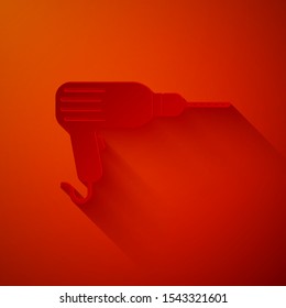 Paper cut Drill machine icon isolated on red background. Paper art style. Vector Illustration