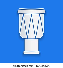 Paper cut Drum icon isolated on blue background. Music sign. Musical instrument symbol. Paper art style. Vector Illustration