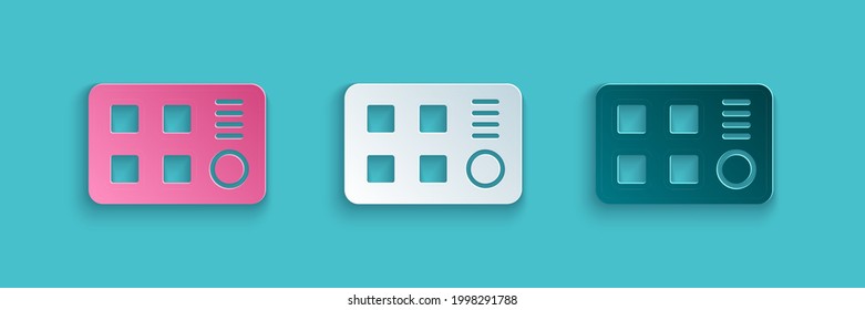 Paper cut Drum machine icon isolated on blue background. Musical equipment. Paper art style. Vector