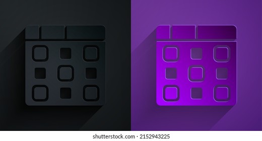 Paper cut Drum machine music producer equipment icon isolated on black on purple background. Paper art style. Vector
