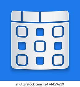 Paper cut Drum machine music producer equipment icon isolated on blue background. Paper art style. Vector