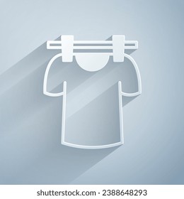 Paper cut Drying clothes icon isolated on grey background. Clean shirt. Wash clothes on a rope with clothespins. Clothing care and tidiness. Paper art style. Vector