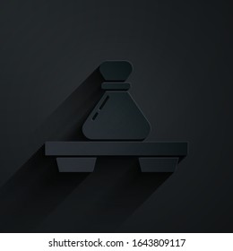 Paper cut Dumpling on cutting board icon isolated on black background. Traditional chinese dish. Paper art style. Vector Illustration