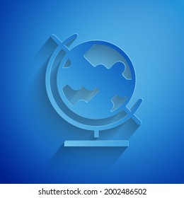 Paper cut Earth globe icon isolated on blue background. Paper art style. Vector