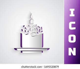 Paper cut Easter cake and candle icon isolated on grey background. Happy Easter. Paper art style. Vector Illustration