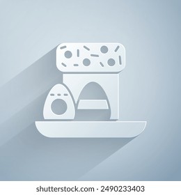 Paper cut Easter cake and eggs icon isolated on grey background. Happy Easter. Paper art style. Vector Illustration
