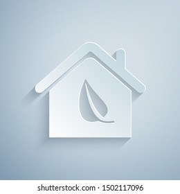 Paper cut Eco friendly house icon isolated on grey background. Eco house with leaf. Paper art style. Vector Illustration