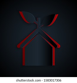 Paper cut Eco friendly house icon isolated on black background. Eco house with leaf. Paper art style. Vector Illustration