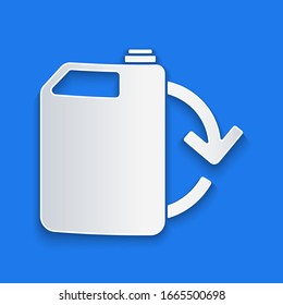 Paper cut Eco fuel canister icon isolated on blue background. Eco bio and barrel. Green environment and recycle. Paper art style. Vector Illustration
