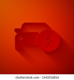 Paper cut Electric car and electrical cable plug charging icon isolated on red background. Renewable eco technologies. Paper art style. Vector Illustration