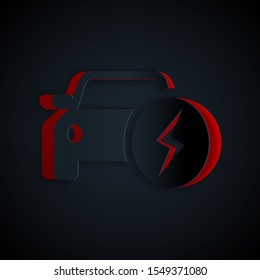 Paper cut Electric car and electrical cable plug charging icon isolated on black background. Renewable eco technologies. Paper art style. Vector Illustration