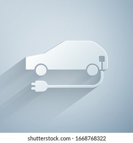 Paper cut Electric car and electrical cable plug charging icon isolated on grey background. Renewable eco technologies. Paper art style. Vector Illustration