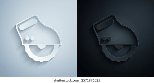 Paper cut Electric circular saw with steel toothed disc icon isolated on grey and black background. Electric hand tool for cutting wood or metal. Paper art style. Vector