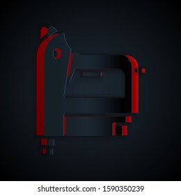 Paper cut Electric construction stapler icon isolated on black background. Working tool. Paper art style. Vector Illustration