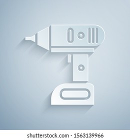 Paper cut Electric cordless screwdriver icon isolated on grey background. Electric drill machine. Repair tool. Paper art style. Vector Illustration