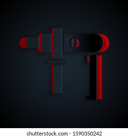 Paper cut Electric drill machine icon isolated on black background. Repair tool. Paper art style. Vector Illustration