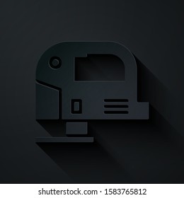 Paper cut Electric jigsaw with steel sharp blade icon isolated on black background. Power tool for woodwork. Paper art style. Vector Illustration