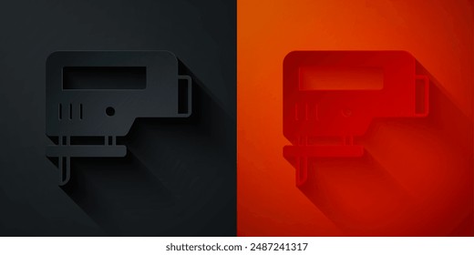 Paper cut Electric jigsaw with steel sharp blade icon isolated on black and red background. Power tool for woodwork. Paper art style. Vector