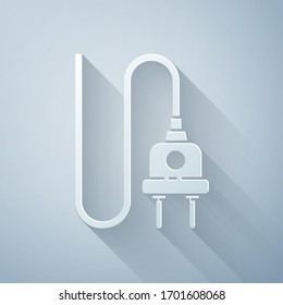 Paper cut Electric plug icon isolated on grey background. Concept of connection and disconnection of the electricity. Paper art style. Vector Illustration
