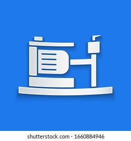 Paper cut Electric water pump icon isolated on blue background. Paper art style. Vector Illustration