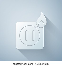 Paper cut Electric wiring of socket in fire icon isolated on grey background. Electrical safety concept. Plug outlet on fire. Paper art style. Vector Illustration