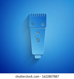 Paper cut Electrical hair clipper or shaver icon isolated on blue background. Barbershop symbol. Paper art style. Vector Illustration