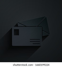 Icono de envoltura de papel aislado en fondo negro. Símbolo de carta de mensaje de correo electrónico. Estilo de arte de papel. Ilustración vectorial