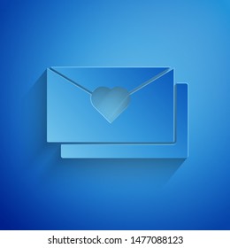 Paper cut Envelope with Valentine heart icon isolated on blue background. Message love. Letter love and romance. Paper art style. Vector Illustration