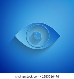 Paper cut Eye icon isolated on blue background. Paper art style. Vector Illustration