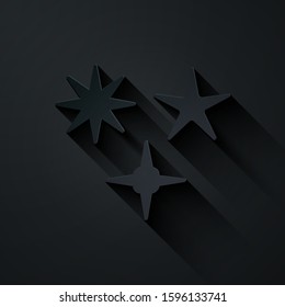 Paper cut Falling star icon isolated on black background. Meteoroid, meteorite, comet, asteroid, star icon. Paper art style. Vector Illustration