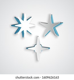 Paper cut Falling star icon isolated on grey background. Meteoroid, meteorite, comet, asteroid, star icon. Paper art style. Vector Illustration