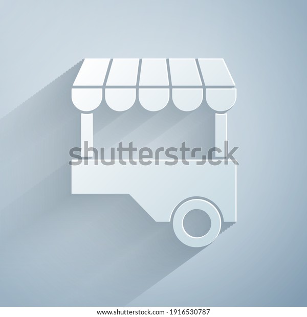 Paper\
cut Fast street food cart with awning icon isolated on grey\
background. Urban kiosk. Paper art style.\
Vector