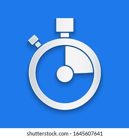 Paper cut Fast time delivery icon isolated on blue background. Timely service, stopwatch in motion, deadline concept, clock speed. Paper art style. Vector Illustration