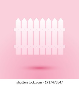 Paper cut Fence wooden icon isolated on pink background. Garden fence sign. Paper art style. Vector.