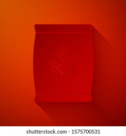 Paper cut Fertilizer bag icon isolated on red background. Paper art style. Vector Illustration