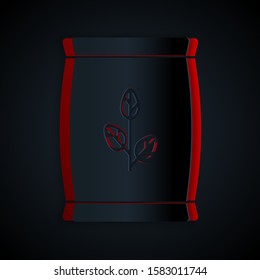 Paper cut Fertilizer bag icon isolated on black background. Paper art style. Vector Illustration